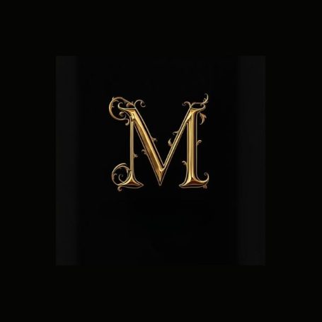 Black notebook cover with a fancy gold capital letter M